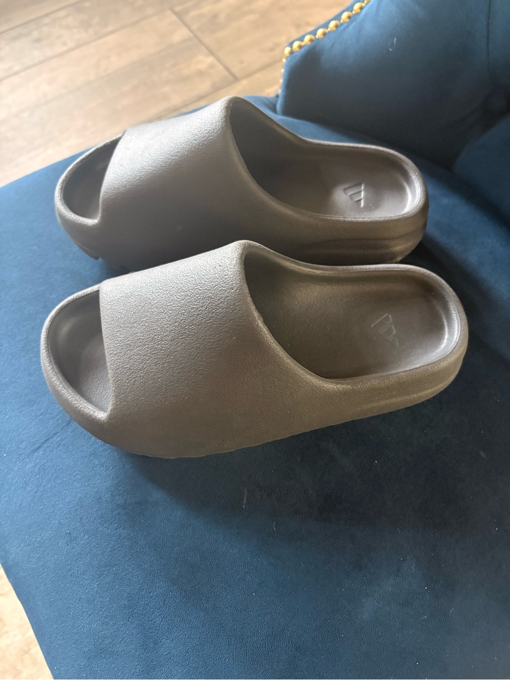 Adidas Yeezy slides. Worn a few times around the house. Size 7 in women’s.